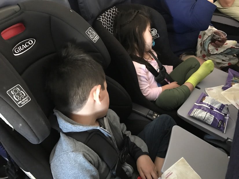 Kids Sleeping on Plane